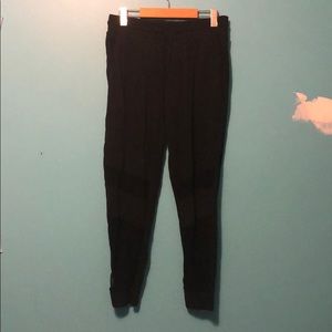 Track pants with mesh
